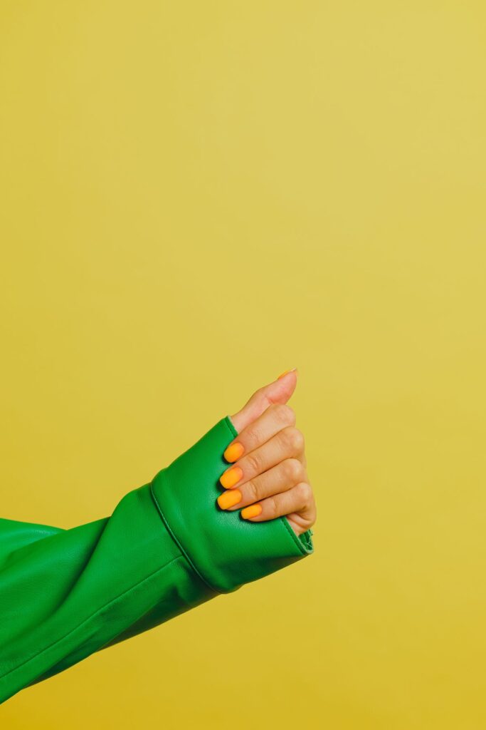 Close up of colored finger nails