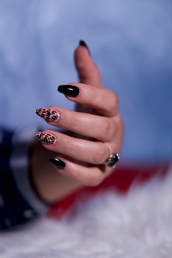 Close up of stylish manicure with leopard print
