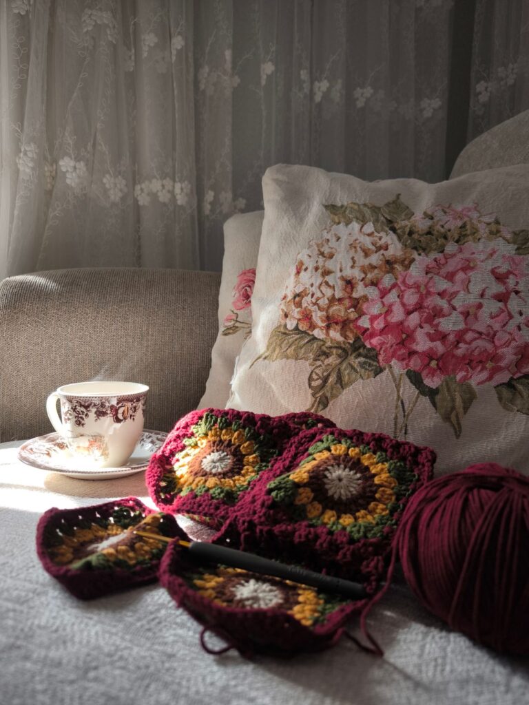 Cozy afternoon with crochet and tea