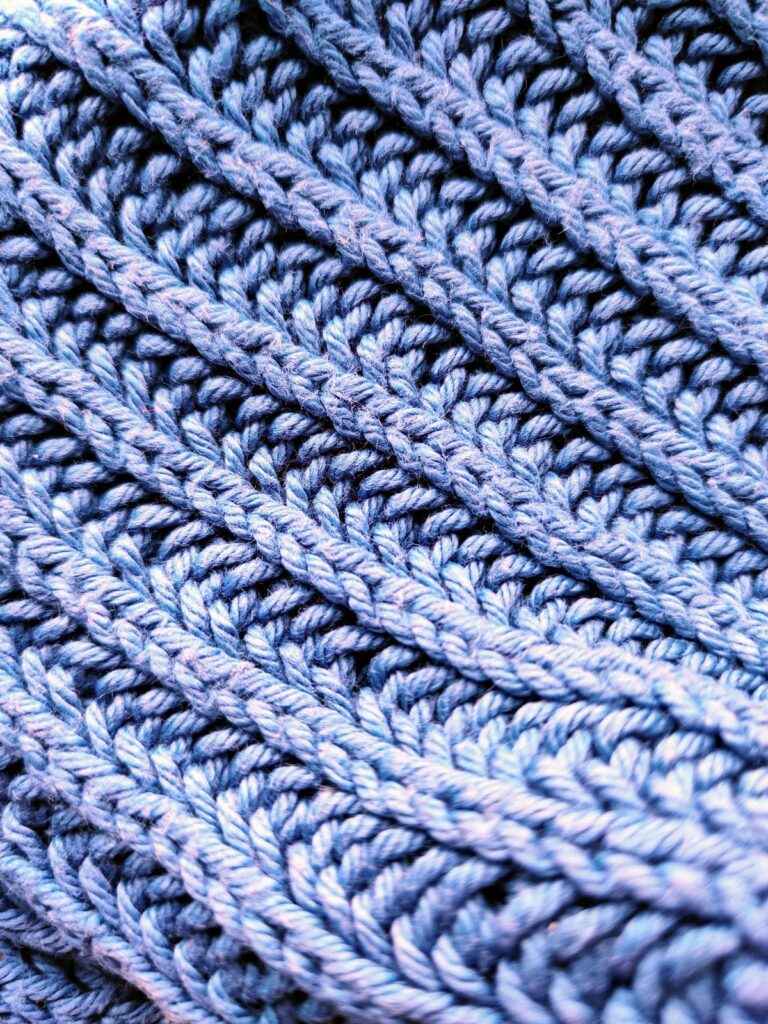 Knitted yarn in close up photography